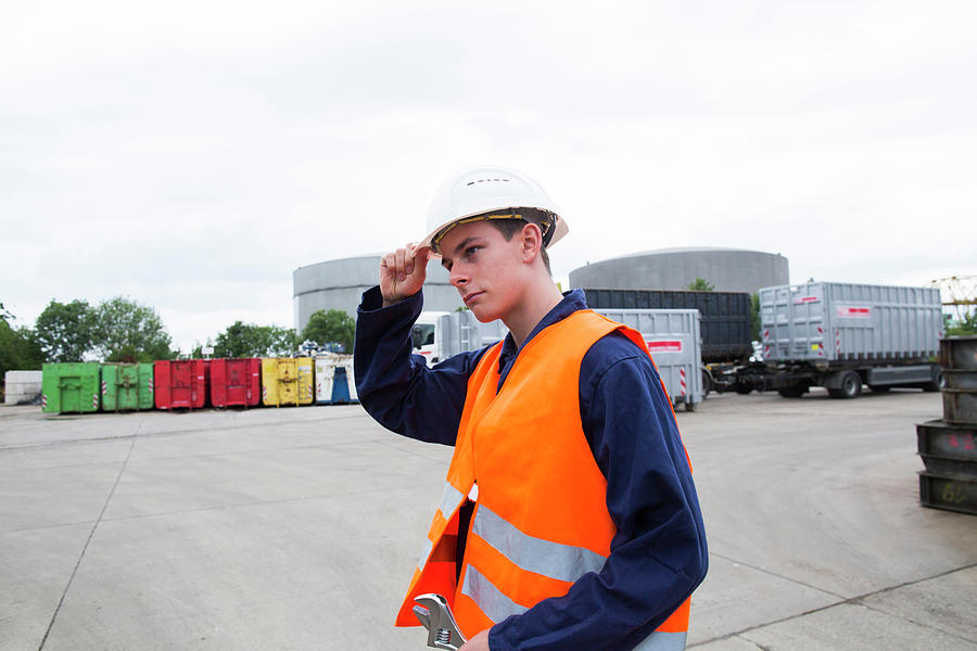 Truck Photograph - Worker Young Male Walking Over A Ground by Cavan Images
