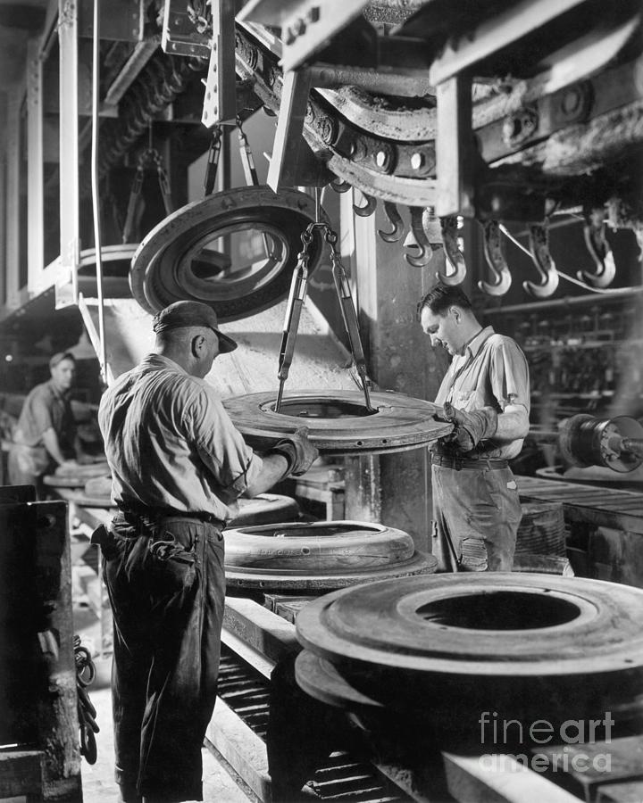 Workers At A Tire Manufacturing Plant Photograph by Bettmann