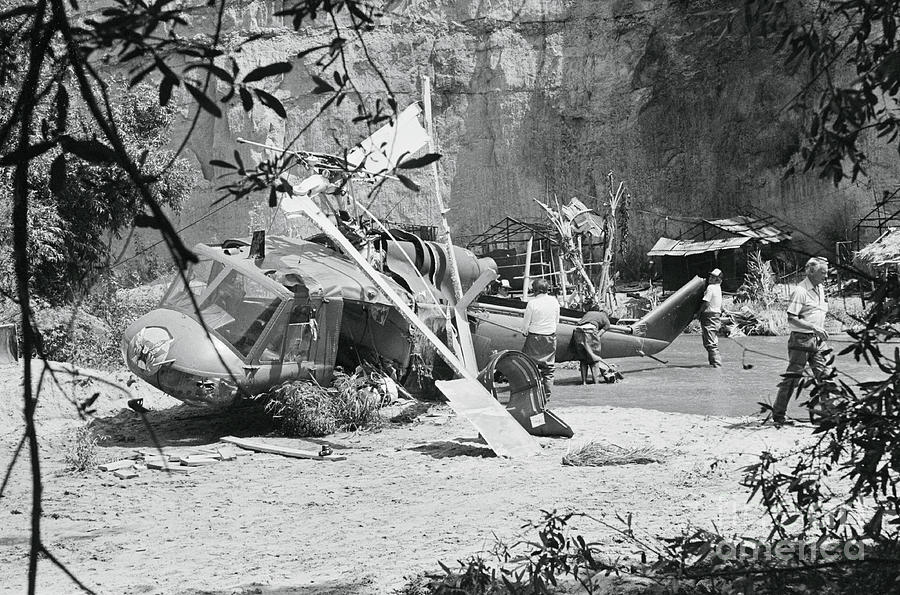 Workers At Helicopter Crash Site Photograph by Bettmann