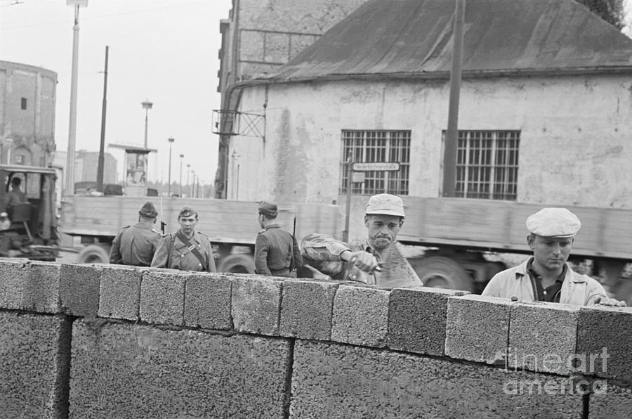 Workers Build Berlin Wall As Police Photograph by Bettmann