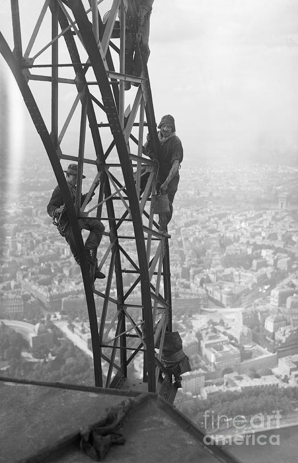 Workers Painting The Eiffel Tower Photograph by Bettmann