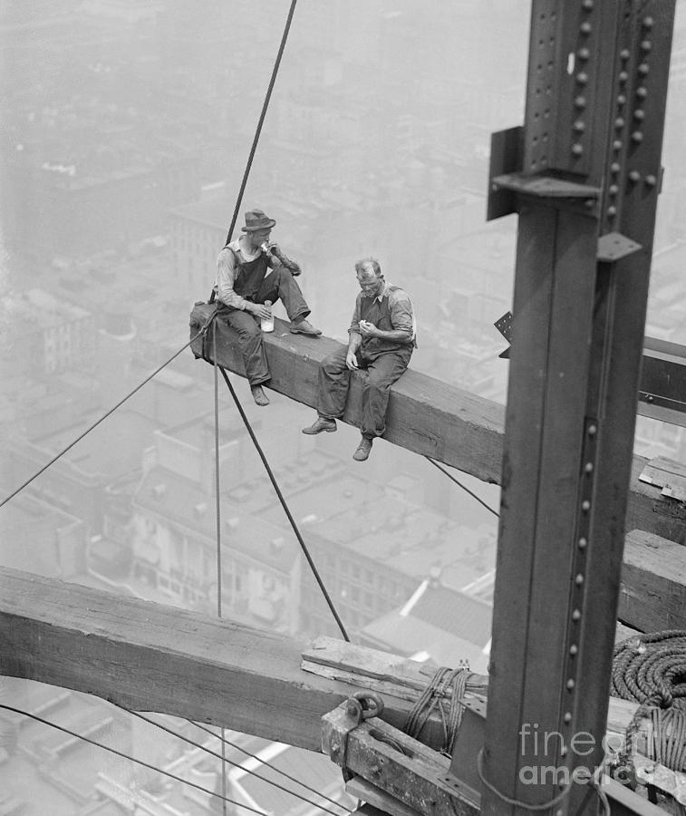Workers Sitting On Steel Beam by Bettmann
