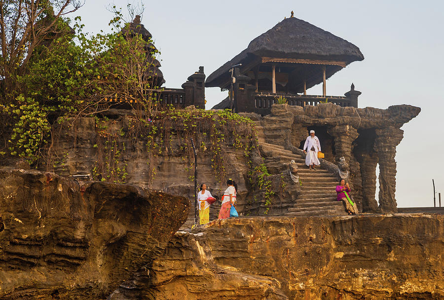 Worshippers at Tanah Lot, Bali Photograph by Aashish Vaidya