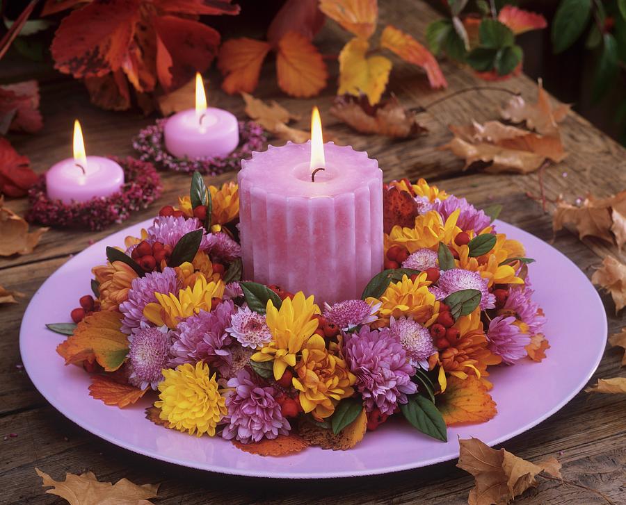 Wreath Of Chrysanthemums & Cotoneaster With Candle On Plate Photograph by Friedrich Strauss