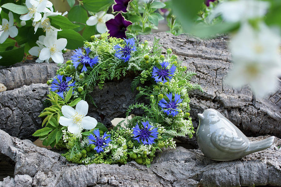 Wreath Of Cornflowers And Mock Orange Flowers Photograph by Angelica Linnhoff