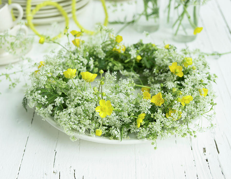 Wreath Of Cow Parsley And Buttercups On Plate As Table Decoration For 60th Birthday Photograph by Martina Schindler