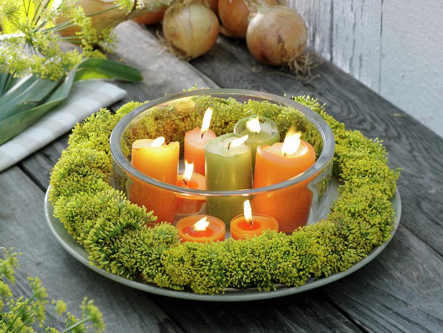 Wreath Of Fennel Flowers Around Burning Candles In Glass Photograph by Strauss, Friedrich