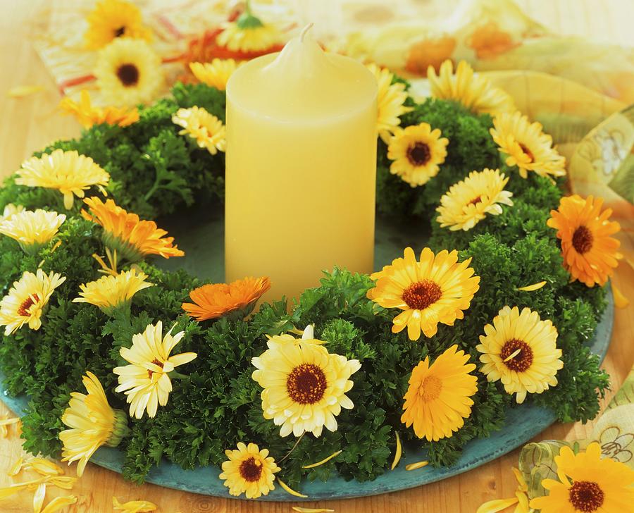 Wreath Of Parsley With Marigolds And A Candle Photograph by Friedrich Strauss