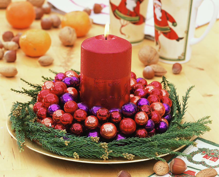 Wreath With Red And Purple Baubles And Red Candle Photograph by Strauss, Friedrich