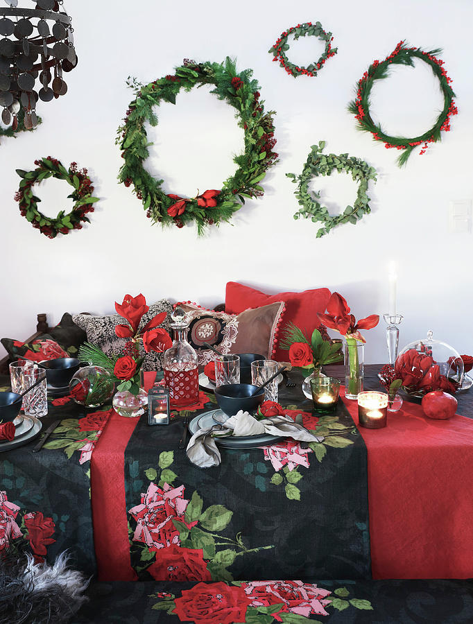 Wreaths Above Table Festively Set In Red And Black Photograph by Annette Nordstrom