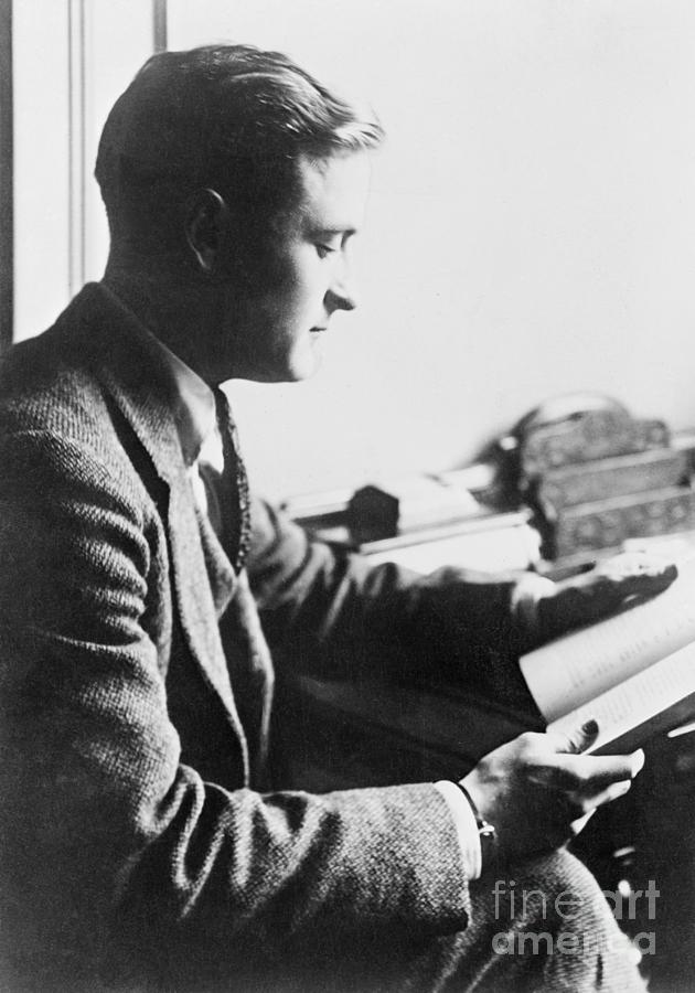 Writer F. Scott Fitzgerald Reading Photograph by Bettmann