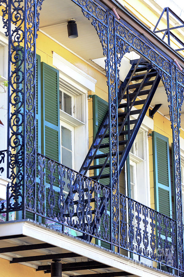 Wrought Iron Balcony New Orleans Photograph by John Rizzuto