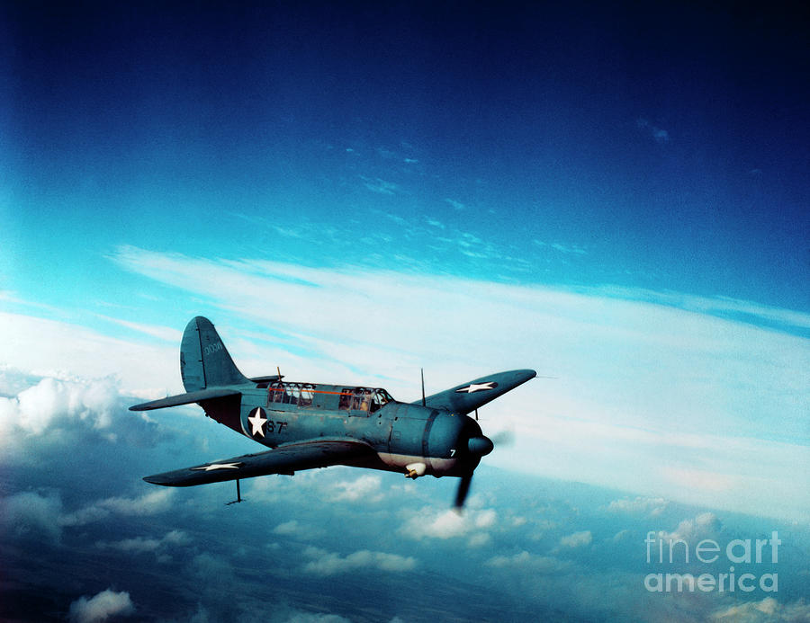 Wwii Curtis Helldiver In Flight Photograph by Bettmann