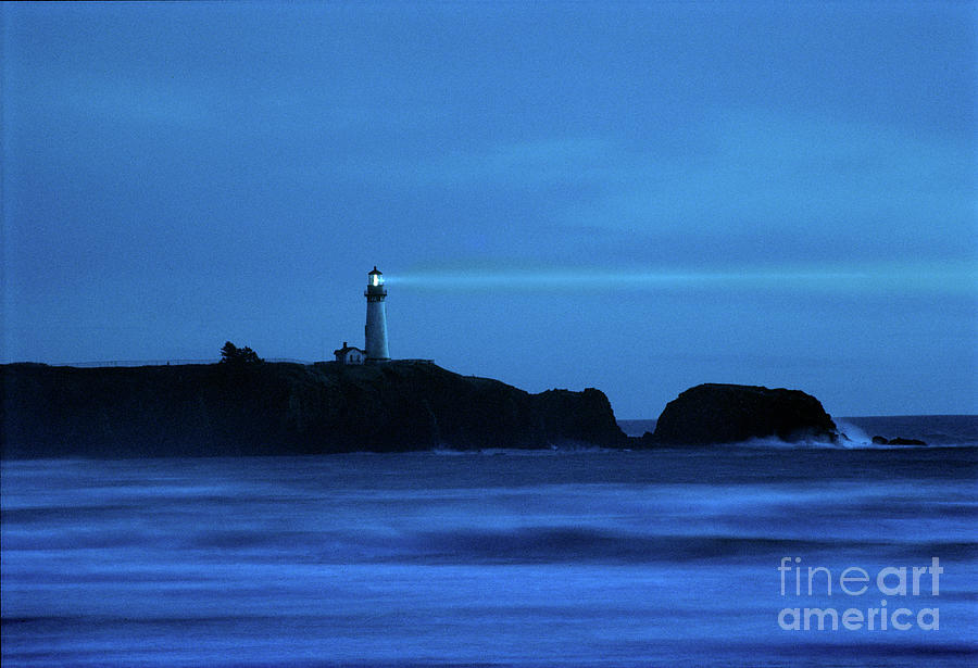 Yaquina Head Lighthouse Shines Into the Night Photograph by Wernher Krutein