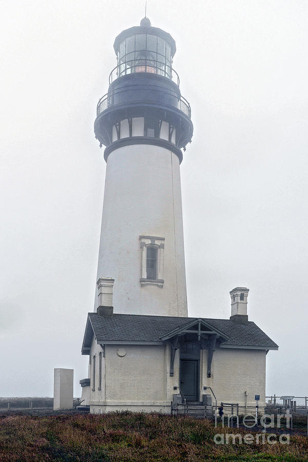 Yaquina Lighthouse In Fog Photograph