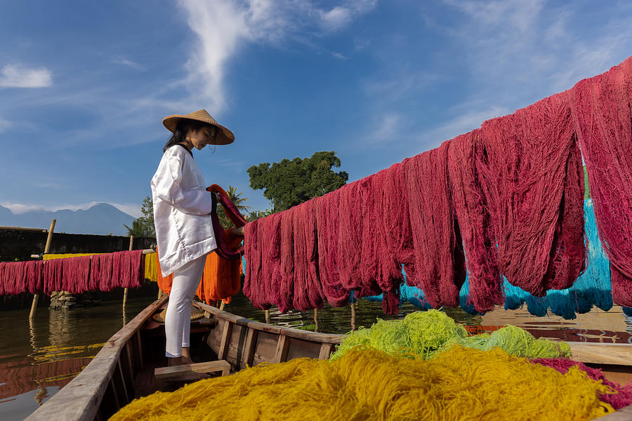 People Photograph - Yarn Drying Worker by Lisdiyanto Suhardjo