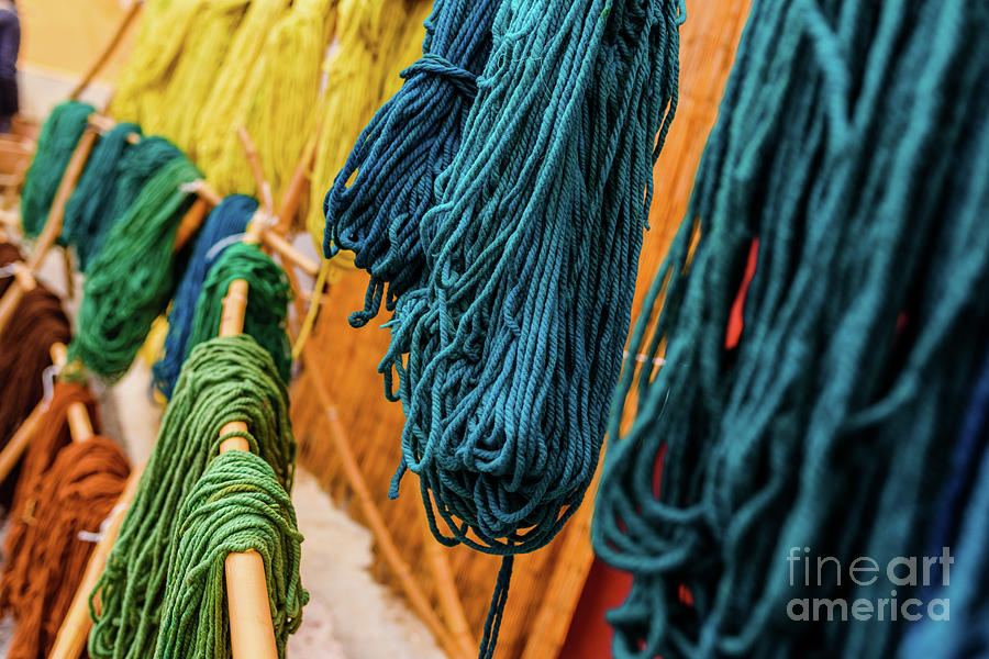 Yarns of colored wool freshly dyed by Arab craftsmen drying in the sun. Photograph by Joaquin Corbalan