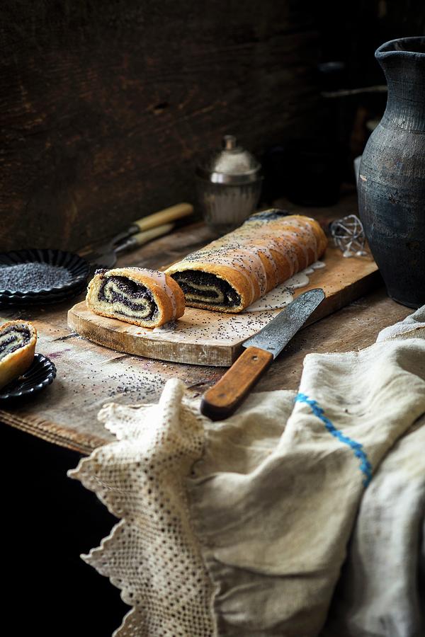 Yeast And Poppy Seed Roll Photograph by Irina Meliukh