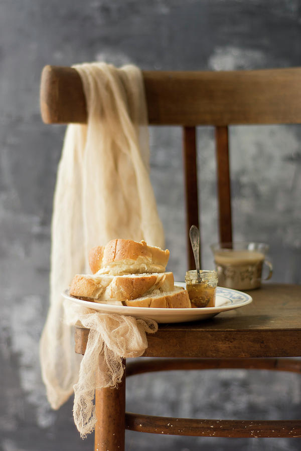 Yeast Bun With Jam On A Chair In A Country Style Photograph by Monika Pazdej
