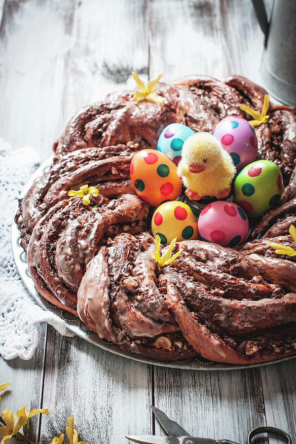 Yeast Dough Wreath Filled With Chocolate Spread For Easter Photograph by Cau De Sucre