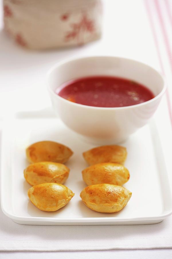 Yeast Dumplings With A Lentil And Tomato Filling And Borscht Photograph by Studio Lipov