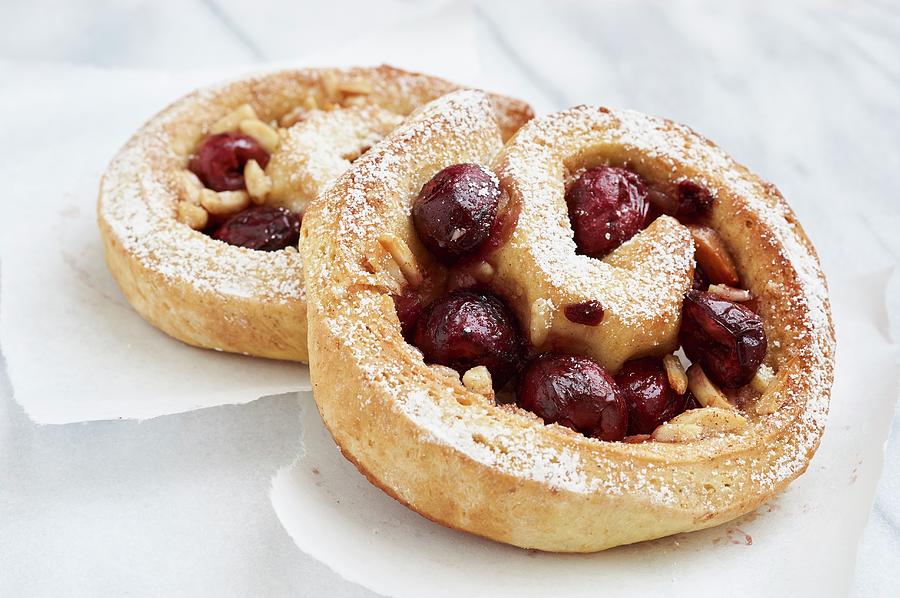 Yeast Pastry Snails With Cherries And Almonds Photograph by Ulrike Emmert