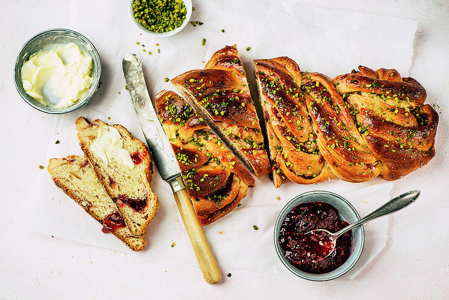 Yeast Plait With Jam Filling And Pistachios Photograph by Ewgenija Schall