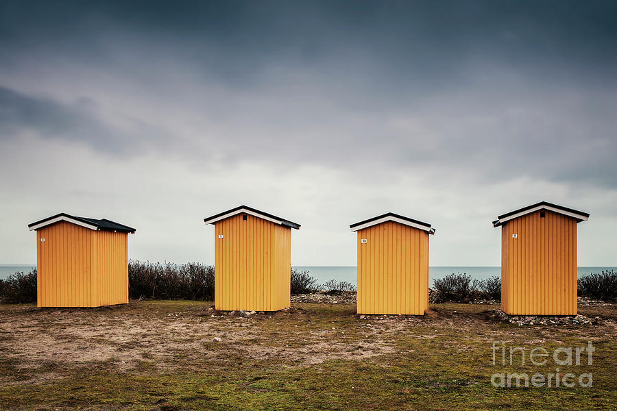 Yellow beach huts Photograph by Sophie McAulay