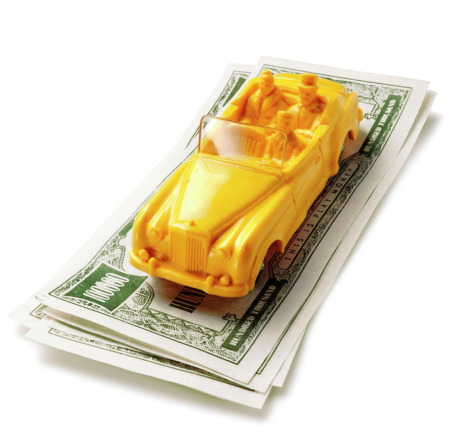 Transportation Drawing - Yellow Car on Stack of Money by CSA Images