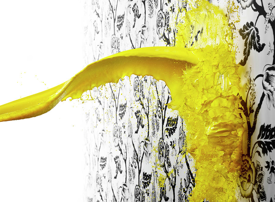 Yellow Paint Splattering On Wallpaper Photograph by Biwa Studio