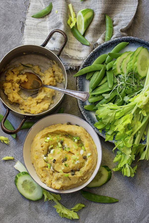 Yellow Pea Dip With Cucumber, Sugar Snap Peas, Celery And Pea Leaves Photograph by Zuzanna Ploch