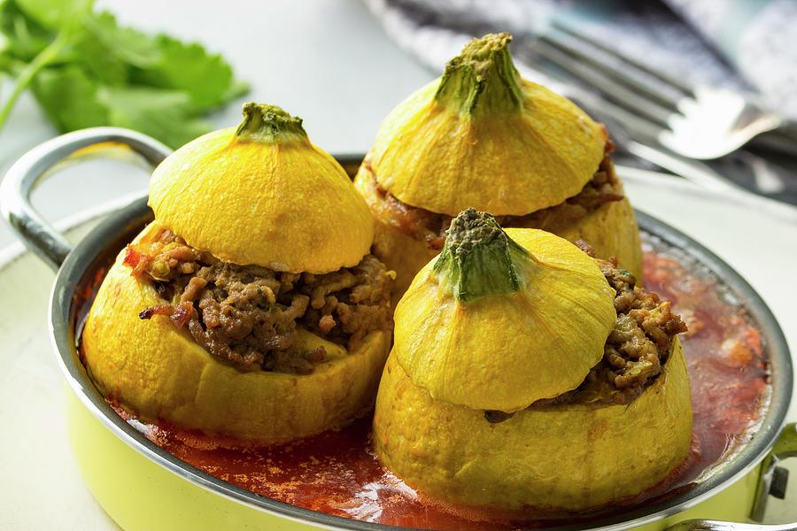 Yellow Squash Filled With Minced Meat And Tomato Sauce And Cutlery Photograph by Charlotte Von Elm