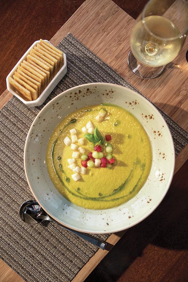 Yellow Tomato Gazpacho With Crackers And White Wine Photograph by Cindy Haigwood