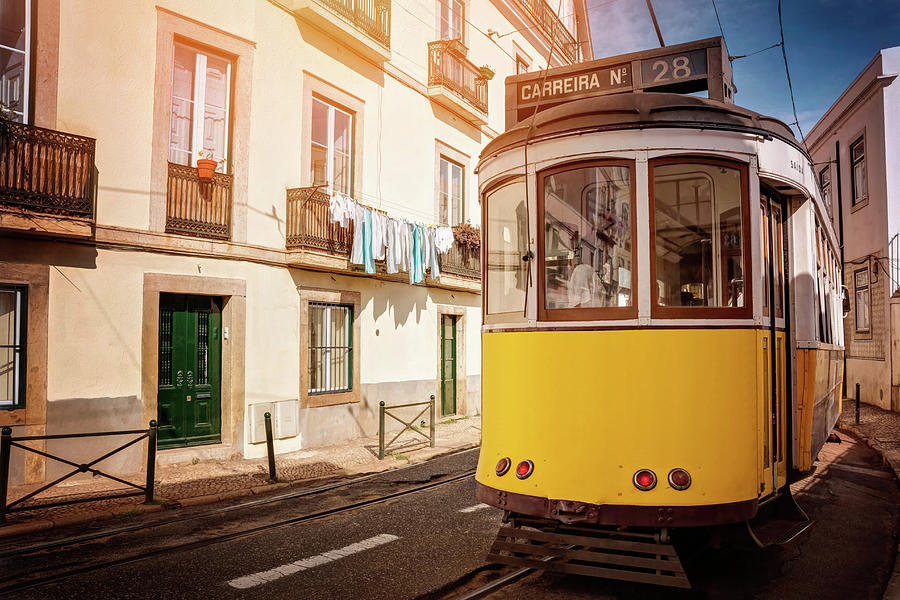 Yellow Tram 28 Lisbon Portugal  Photograph by Carol Japp