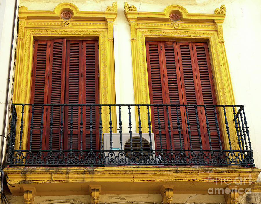 Yellow Windows in Seville Photograph by John Rizzuto