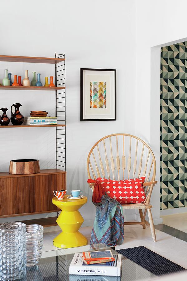 Yellow, Zigzag Stool And Chair With High, Curved Backrest And Radiating Struts Next To Shelving Unit With Fifties-style Base Cabinet Photograph by Great Stock!