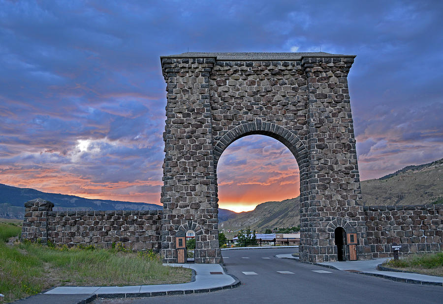 Yellowstones Roosevelt Arch at Sunset Photograph by Bruce Gourley