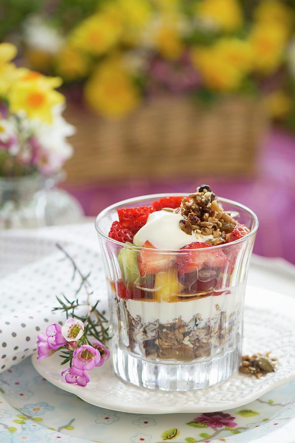 Yoghurt With Cereals And Fruit For A Spring Brunch Photograph by Winfried Heinze