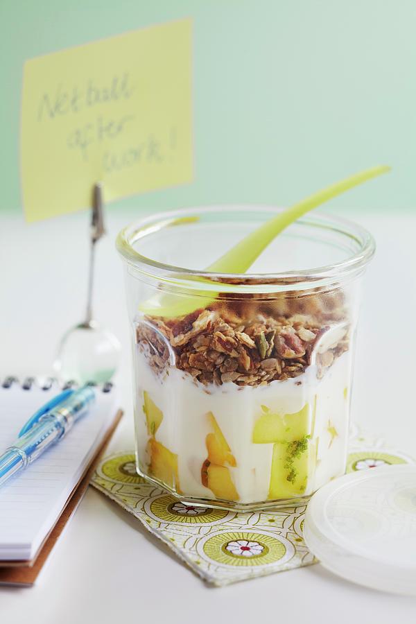 Yoghurt With Mango And Crunchy Nut Muesli Photograph by Charlotte Tolhurst