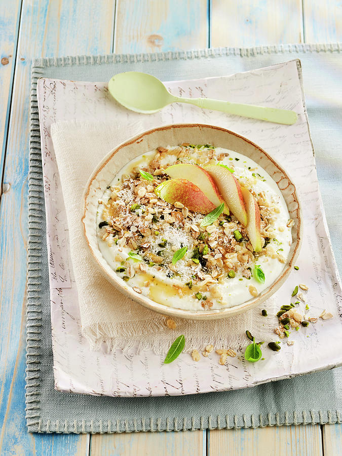 Yoghurt With Muesli And Pears Photograph by Lawton