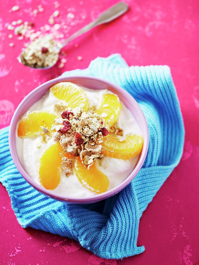 Yoghurt With Orange Segments And Muesli Photograph by Mikkel Adsbl