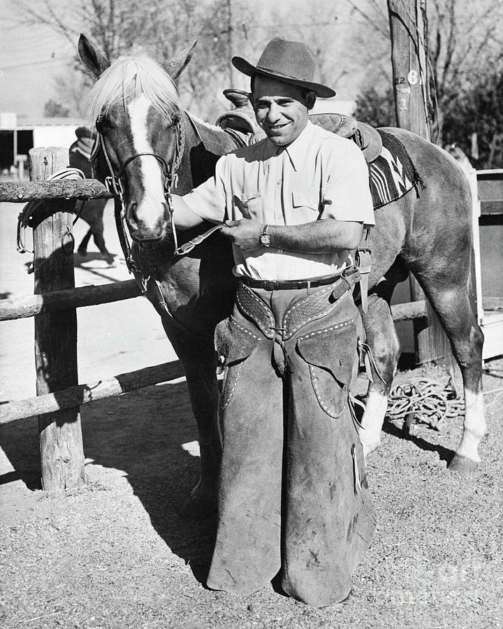 Yogi Berra In Chaps With Horse Photograph by Bettmann