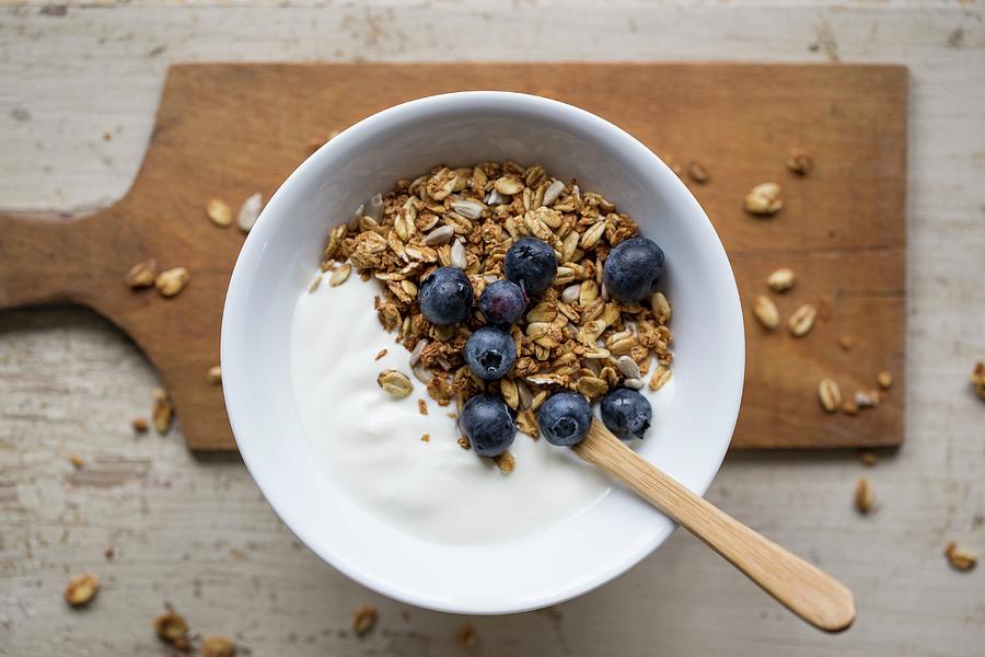 Yogurt With Muesli And Blueberries For Breakfast Photograph by Nicole Godt