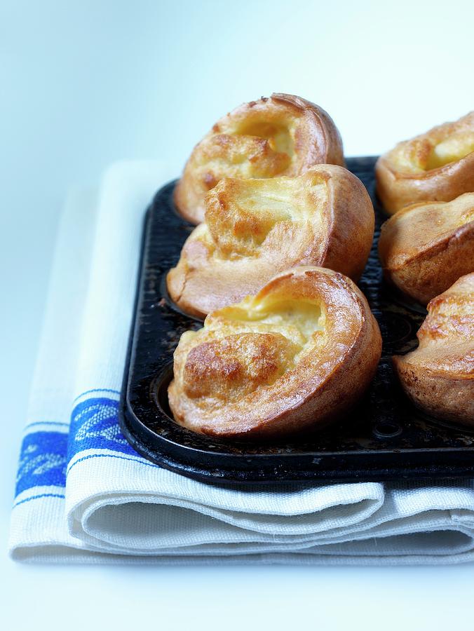 Yorkshire Puddings In The Baking Tin Photograph by Moore, Hilary