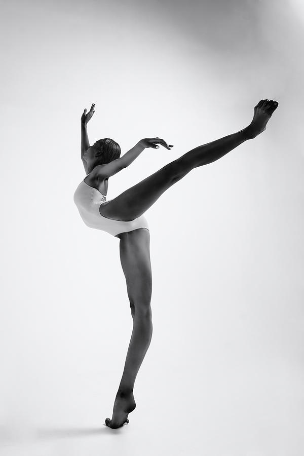 Young Ballerina In A Bodysuit Performs An Attitude Photograph by Alexandr