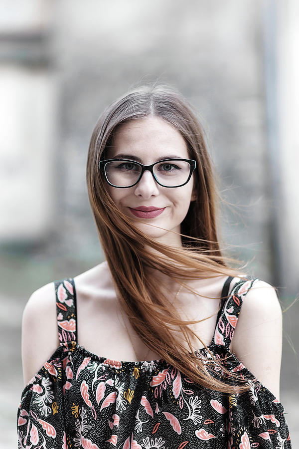 Nature Photograph - Young Brown-haired Millennial With Glasses And Light Dress by Cavan Images