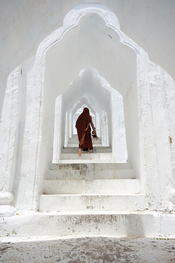 Young Buddhist Monk Going Up The Stairs Photograph by © Santiago Urquijo