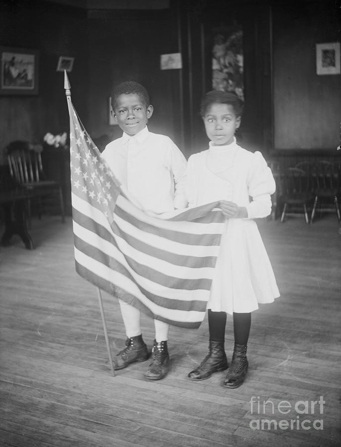 Young Children Holding American Flag Photograph by Bettmann