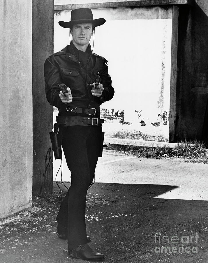 Young Clint Eastwood In Gunslinger Pose By Bettmann