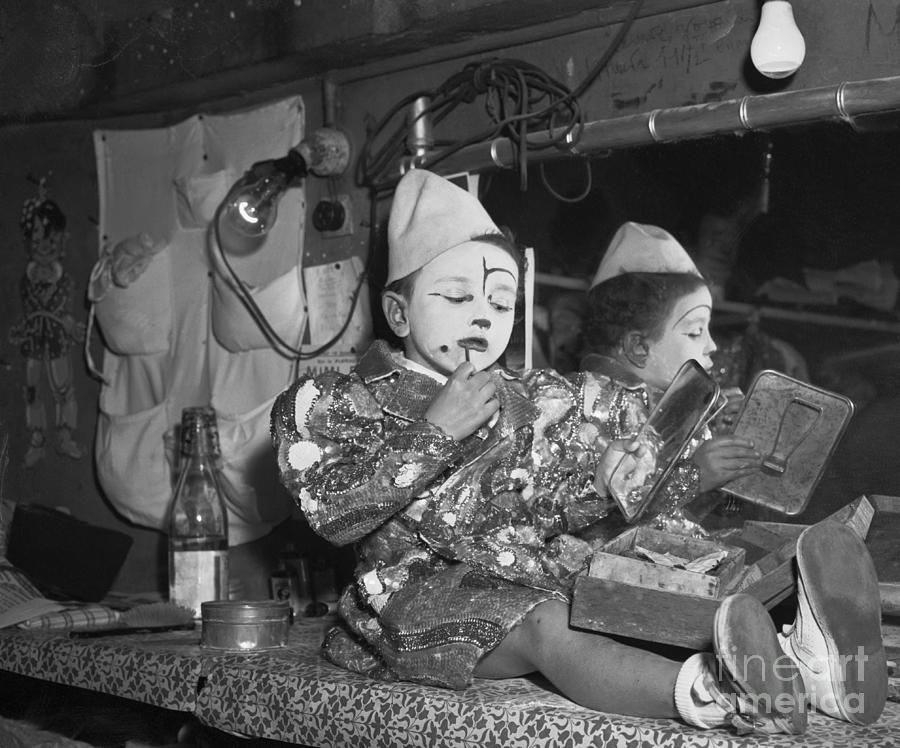 Young Clown Applying His Makeup Photograph by Bettmann